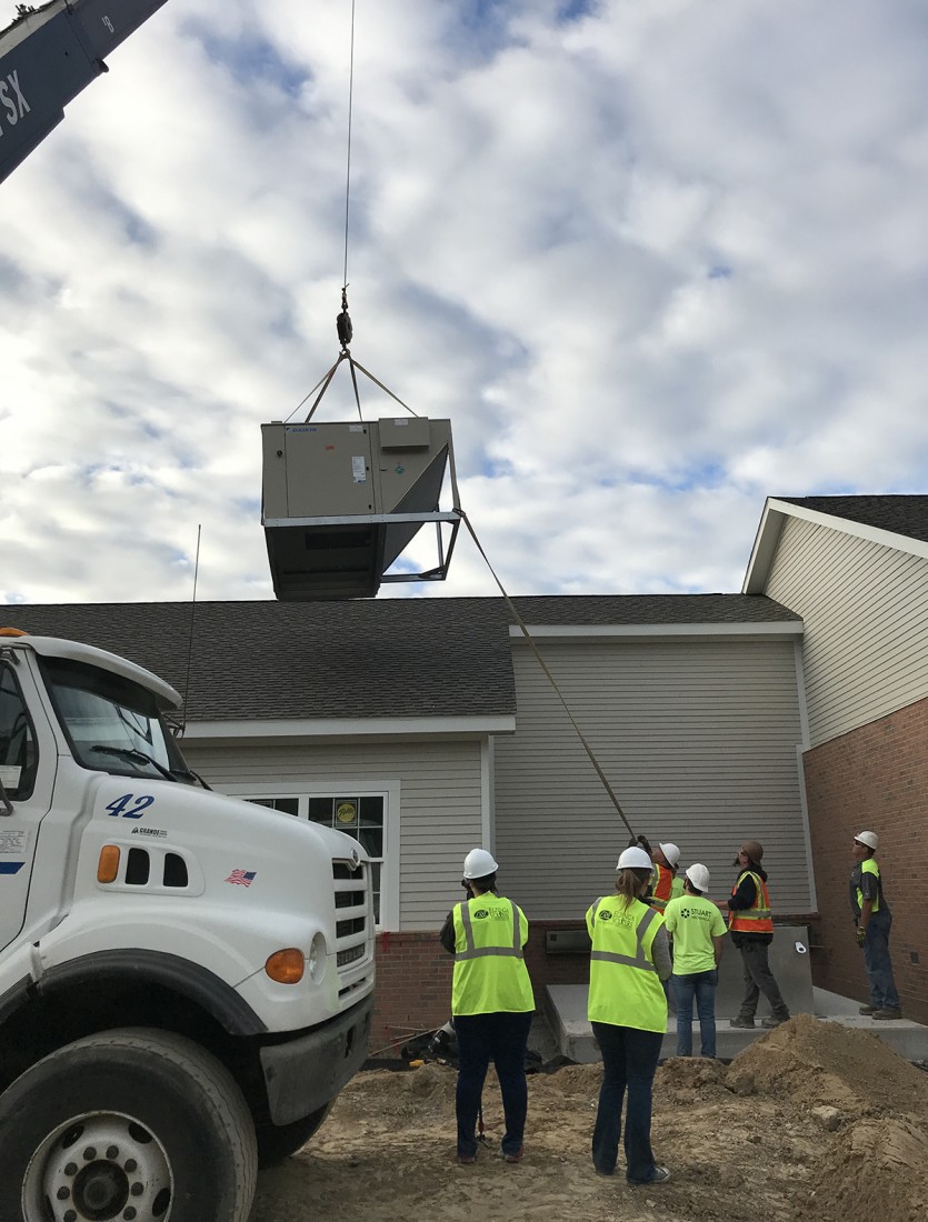 Stuart Mechanical team conducting a commercial HVAC installation