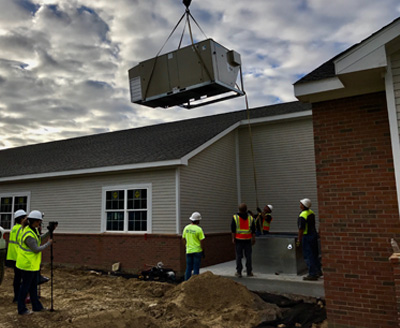 Commercial AC unit installation by Stuart Mechanical in Auburn Hills, MI